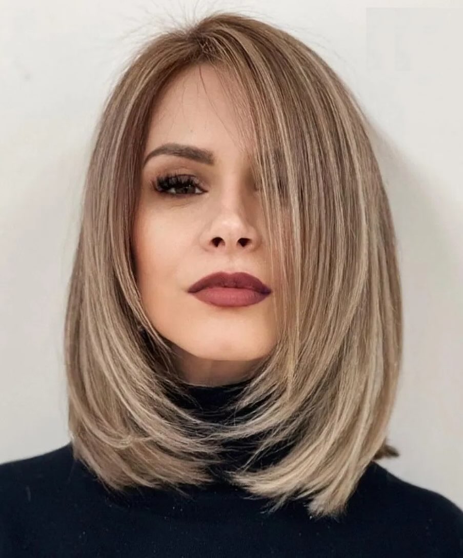 textured summer haircuts for medium hair 2026 Smooth Layered Lob with Soft Curved Ends
