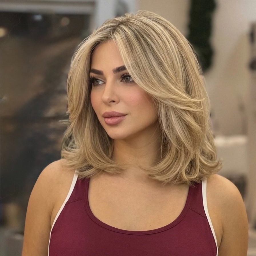 textured summer haircuts for medium hair 2026 Soft Layered Blonde with Dimensional Movement