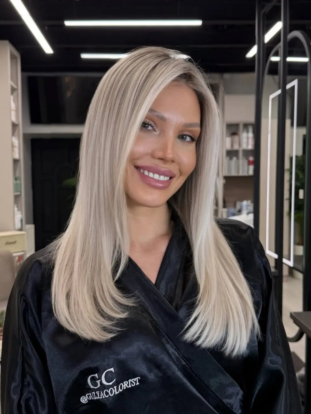 textured summer haircuts for thin fine hair 2026 Sleek platinum length with soft internal layering