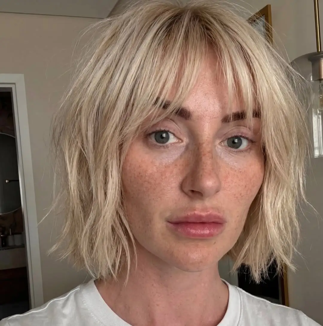 textured summer haircuts for thin fine hair 2026 Airy textured bob with soft broken bangs