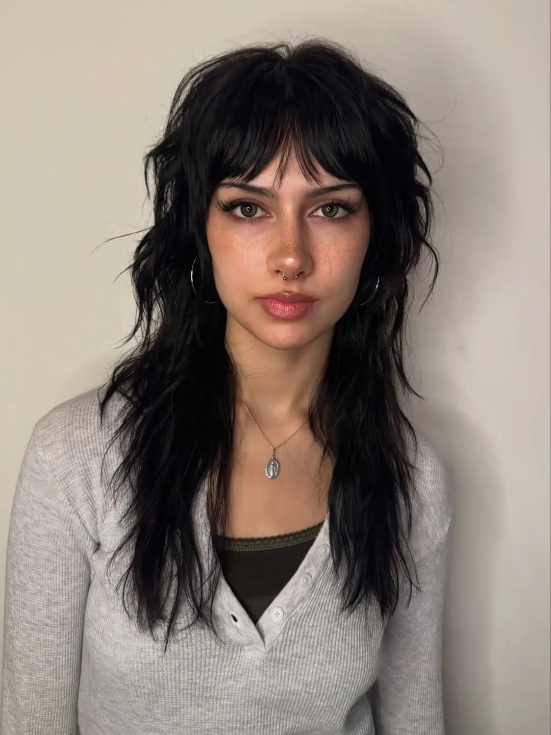textured summer shag haircut 2026 Long Dark Shag With Wispy Curtain Bangs