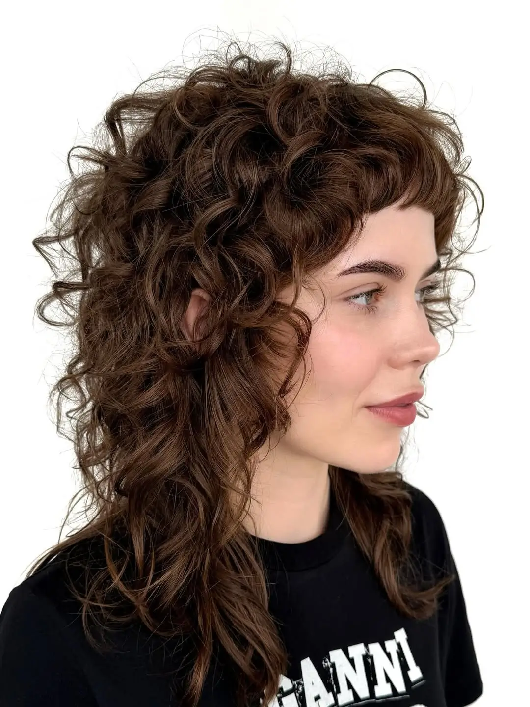 textured summer shag haircut 2026 Defined Curly Medium Shag With Sculpted Layers