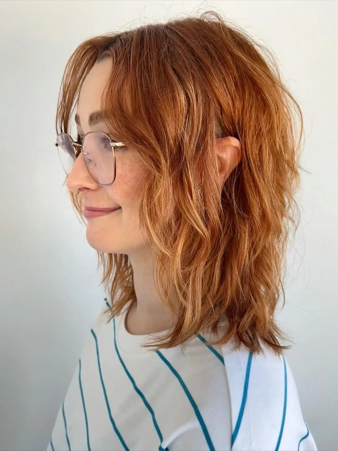 textured summer shag haircut 2026 Sunlit Copper Medium Shag With Natural Waves
