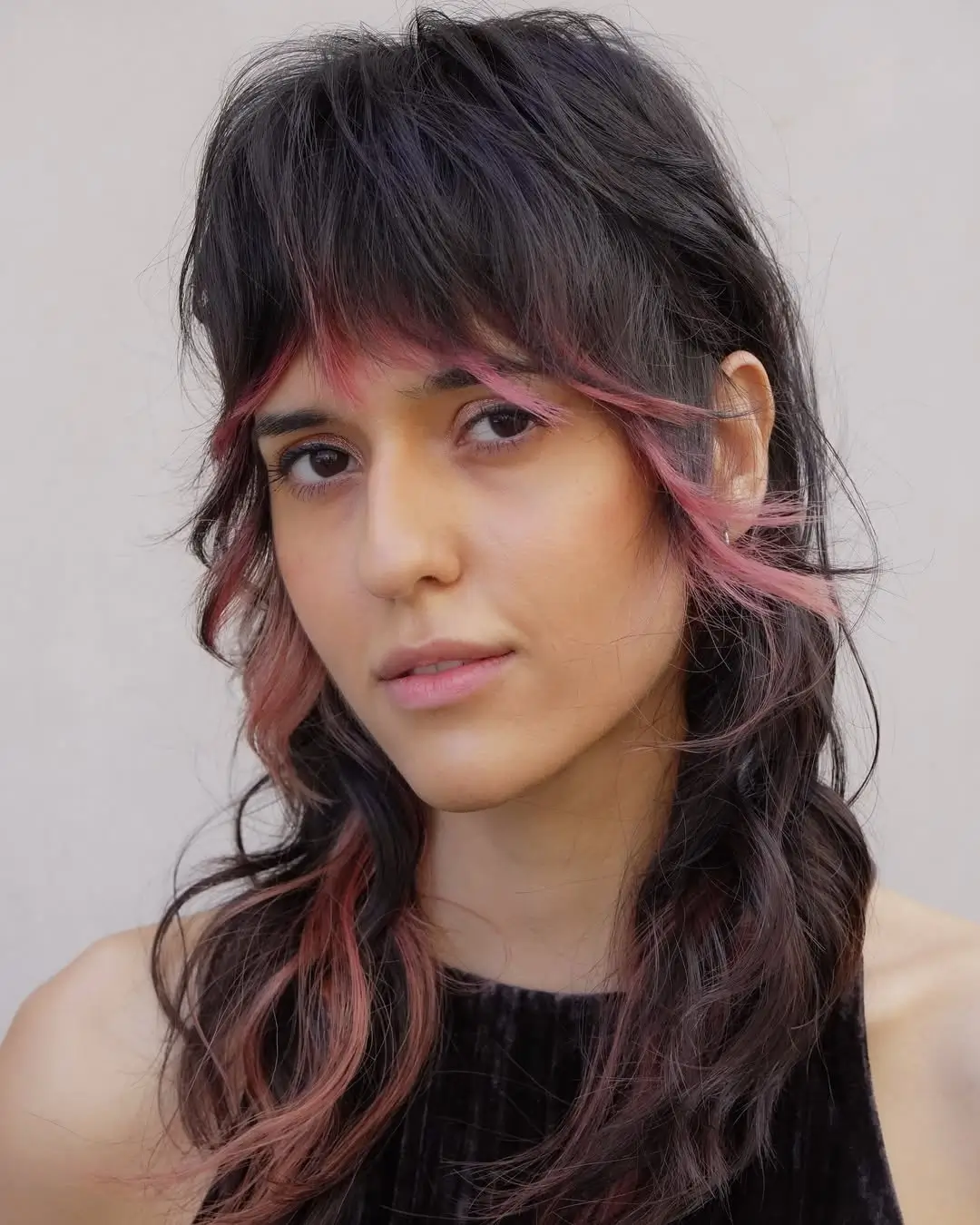 textured summer shag haircut 2026 Soft Wavy Medium Shag With Subtle Pink Accents