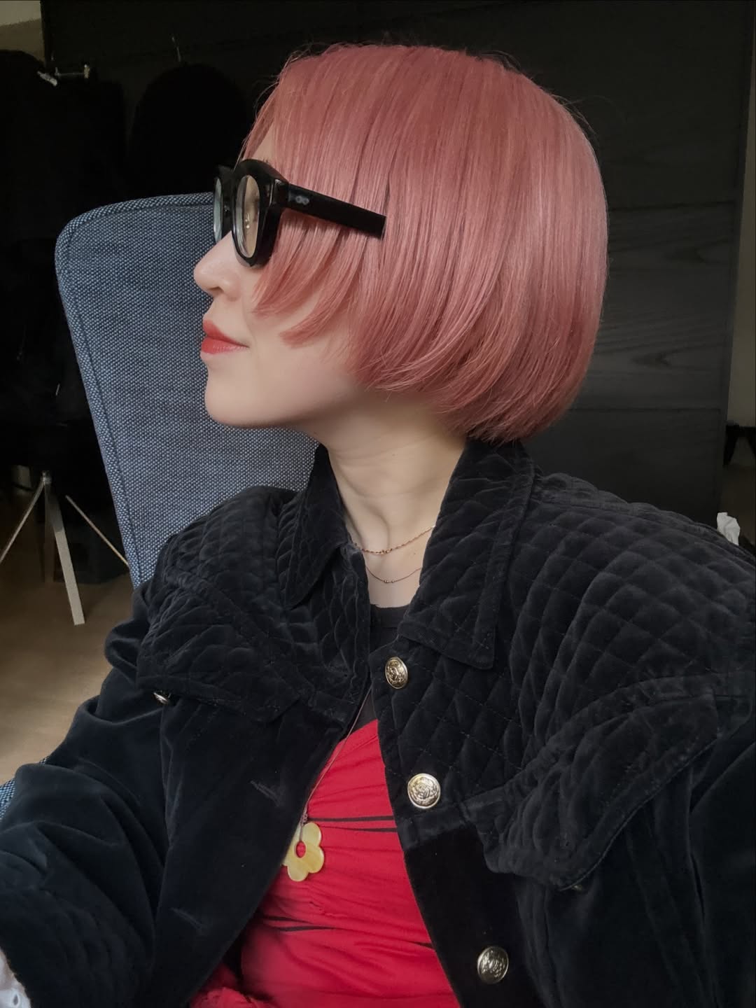 textured summer short haircuts 2026 Glossy Pink Precision Bob With Soft Curve