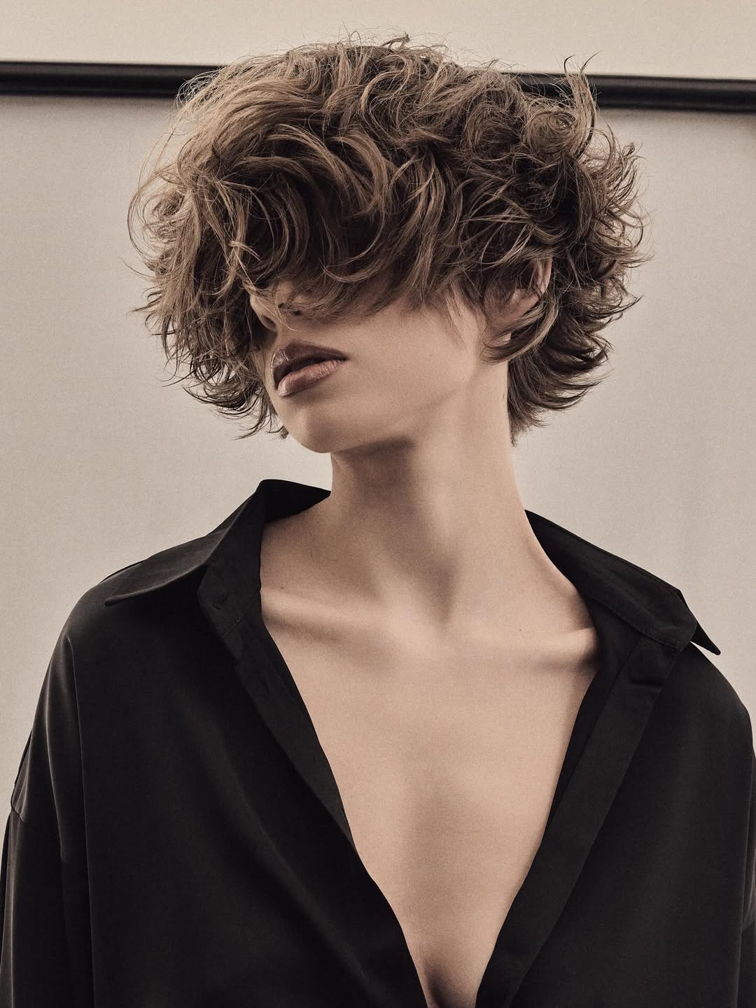 textured summer short haircuts 2026 Textured Curly Pixie With Wild Volume