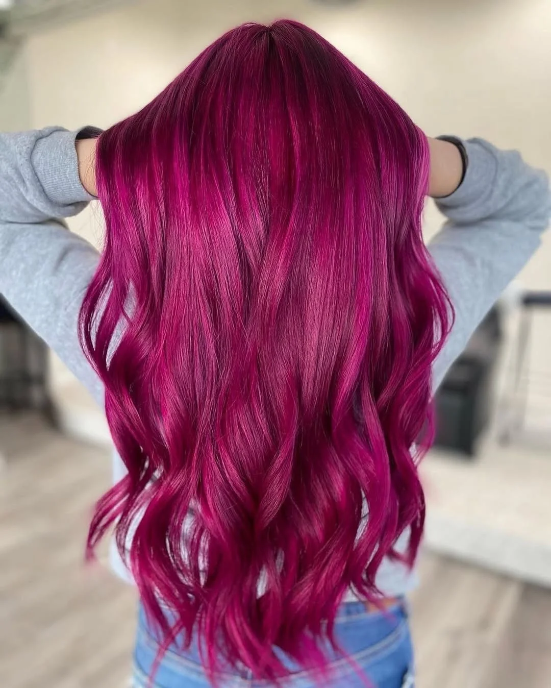 trendy summer hair color ideas 2026 Vivid Raspberry Waves With High Gloss Fantasy Finish