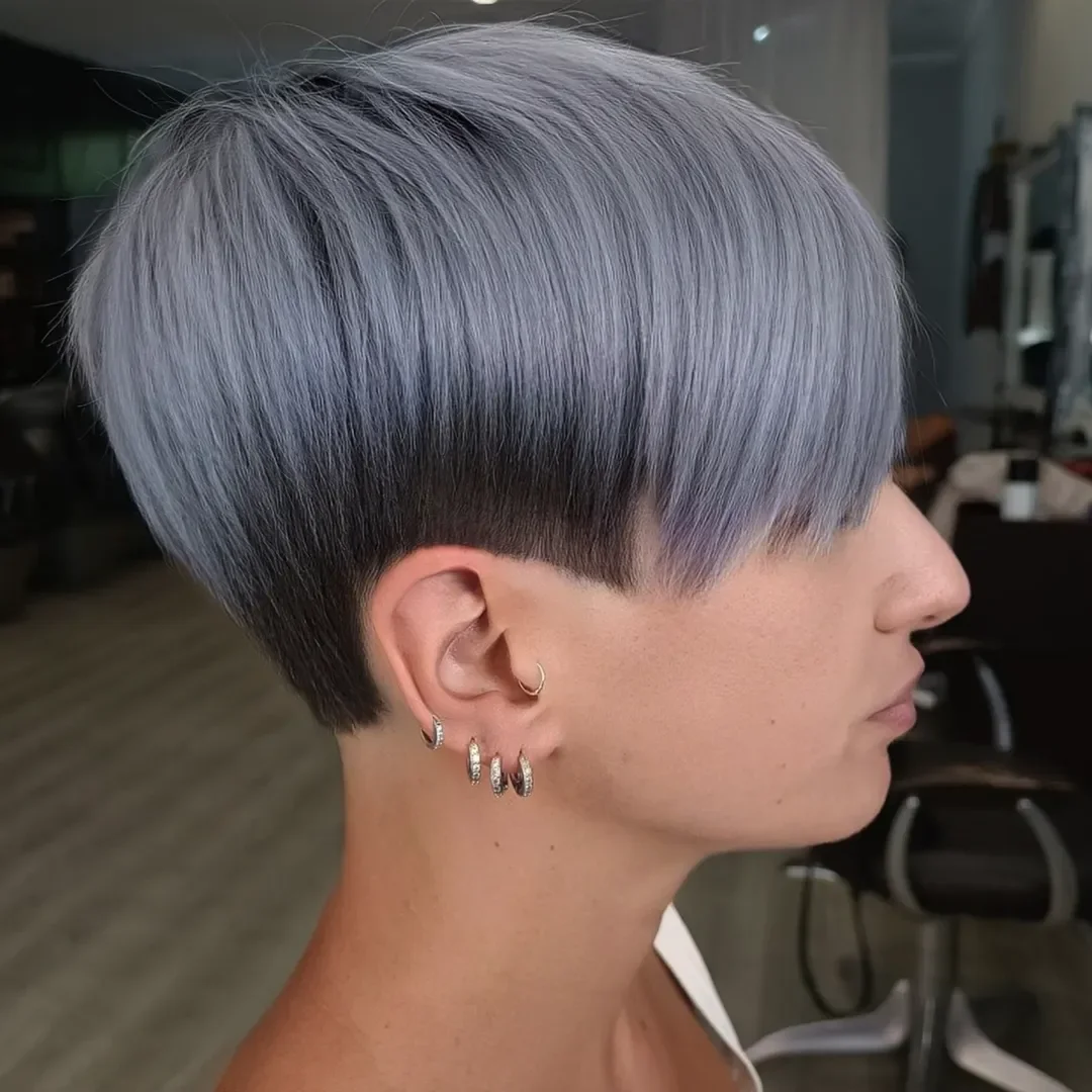 trendy summer hair color ideas 2026 Silver Frost Pixie With Smoky Undercut Dimension