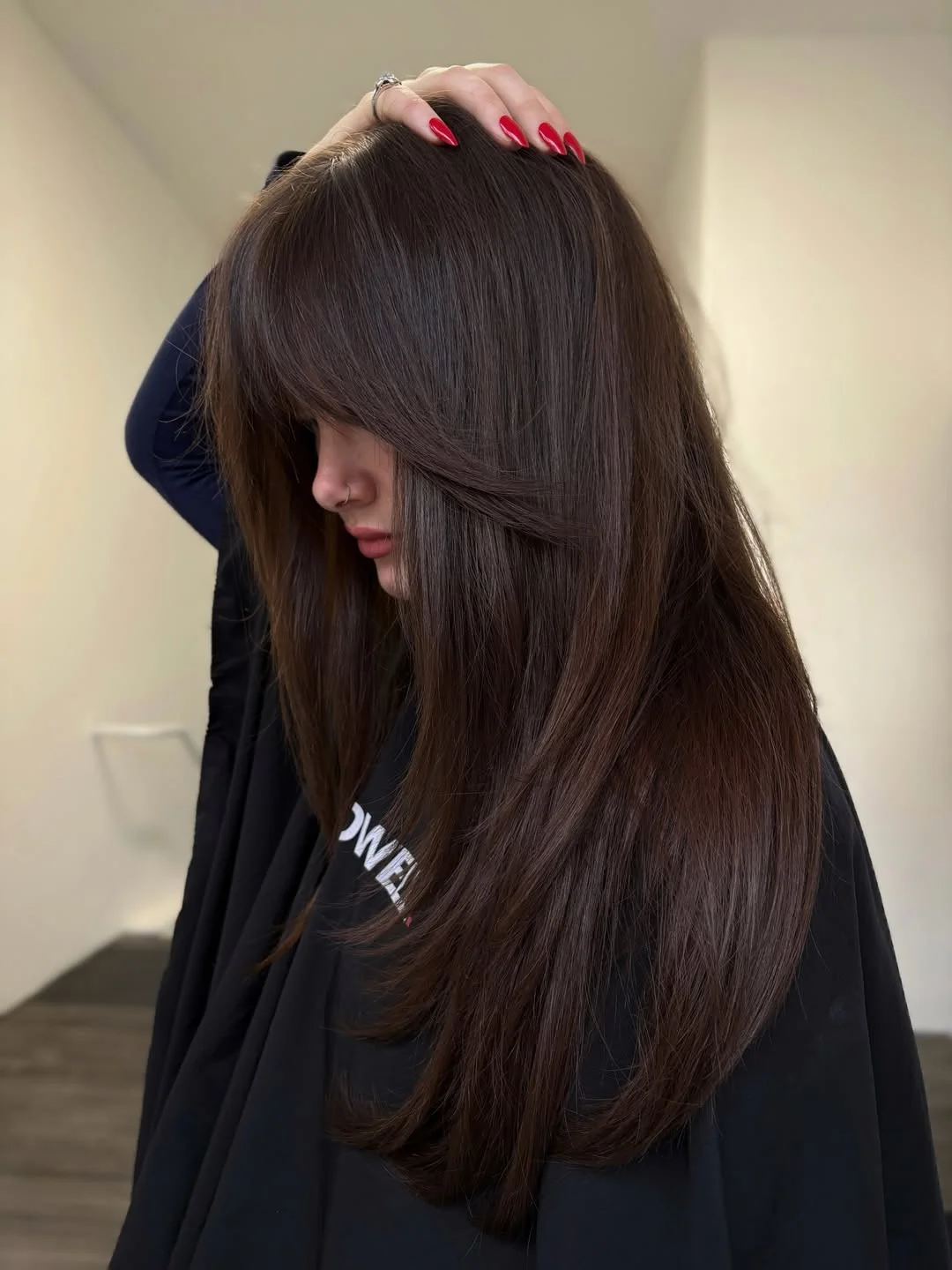 warm summer hair color ideas for brunettes 2026 Soft Mocha Brunette With Feathered Curtain Layers