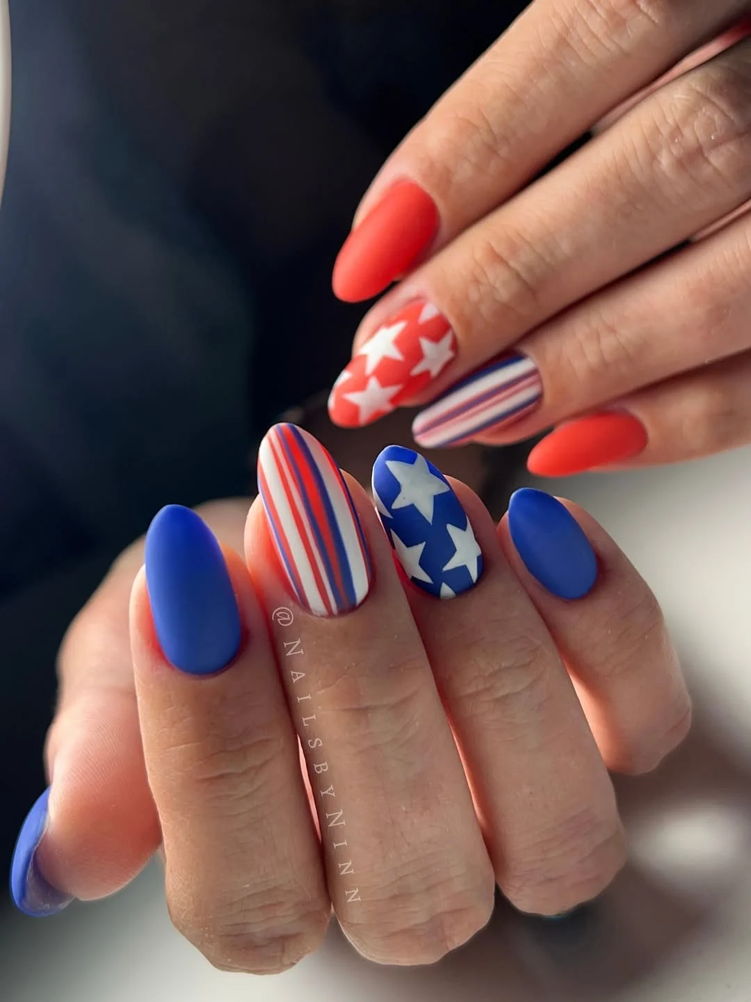 23 4th of july nails 2026 Bold Matte Americana Nails With Graphic Star Patterns