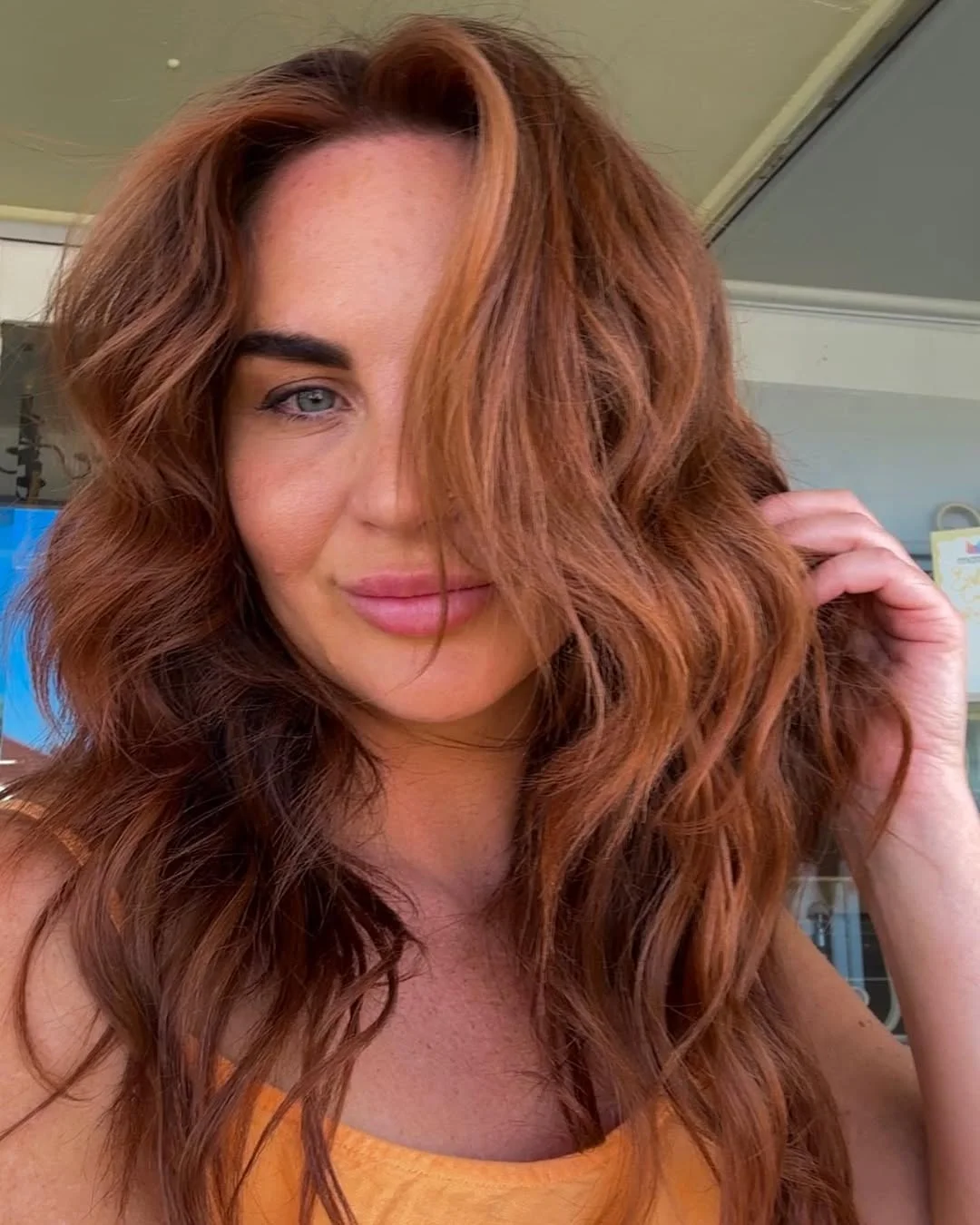 bold summer cowgirl copper hair color 2026 ginger coastal waves
