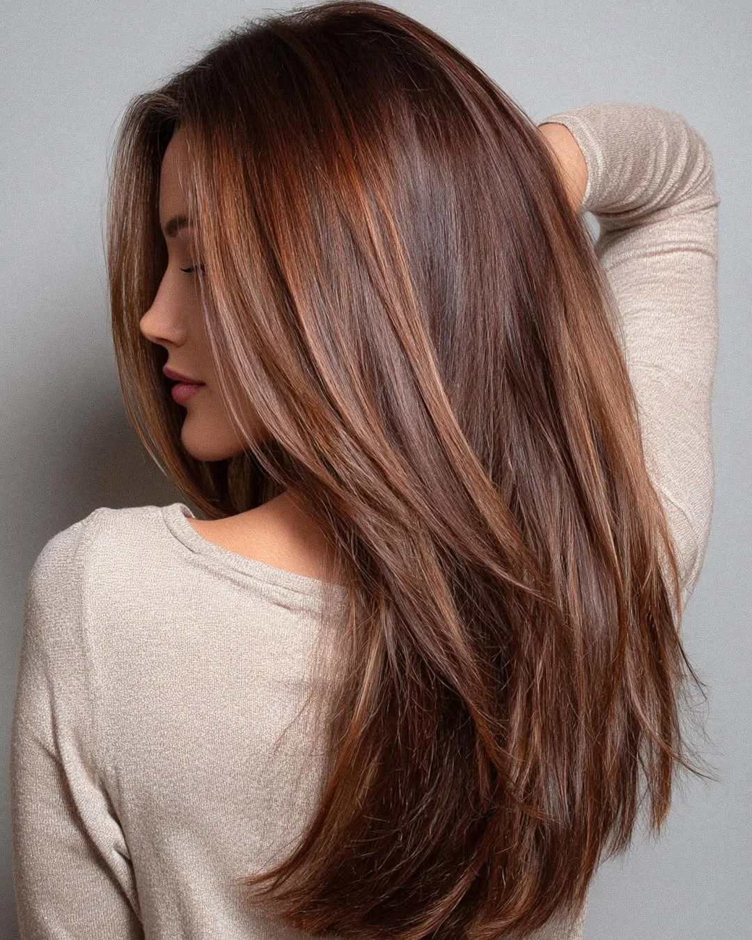 deep summer auburn hair color 2026 Cool-Toned Auburn Brunette With Soft Mocha Highlights