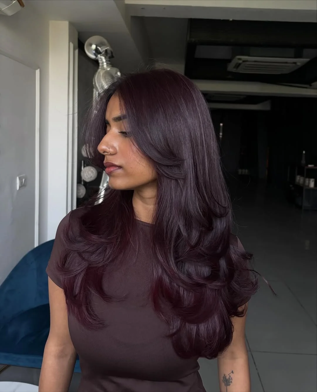deep summer velvet burgundy hair color 2026 Deep Plum Layers With Rich Chocolate Undertones