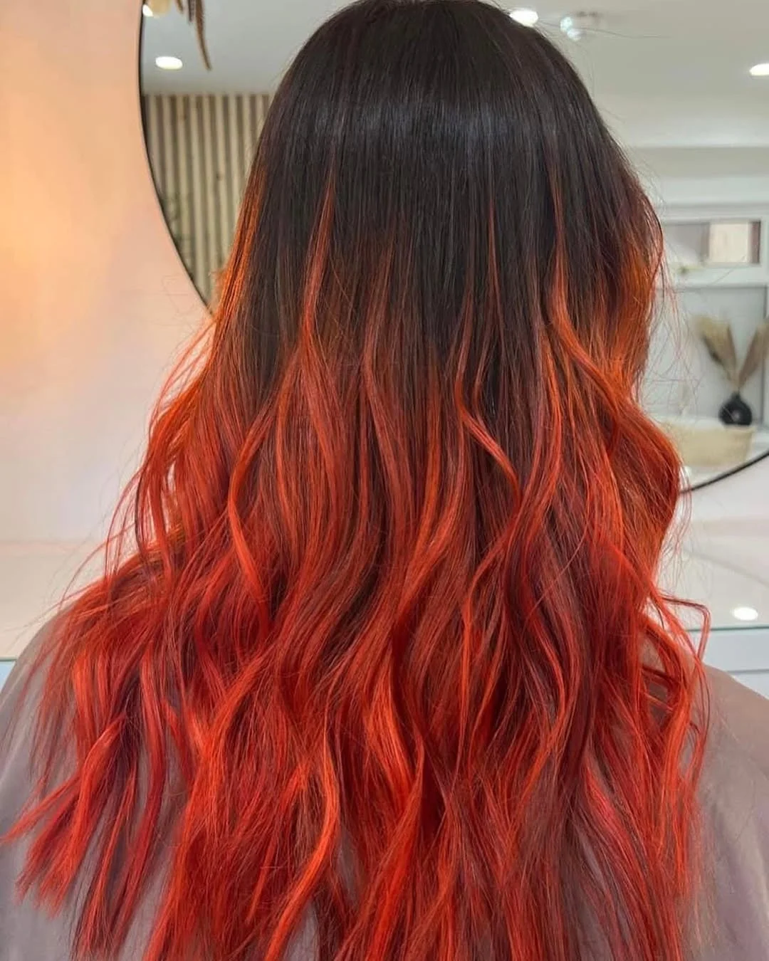 22 fiery summer copper balayage hair ideas 2026 Bright Ember Red Balayage With Smoky Dark Roots