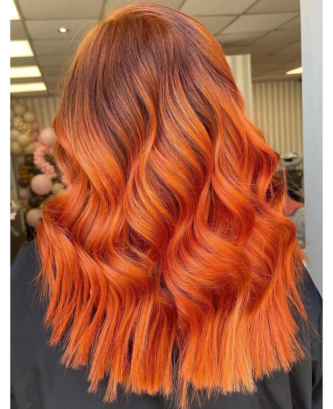 22 fiery summer copper balayage hair ideas 2026 Burnt Orange Balayage On a Textured Lob