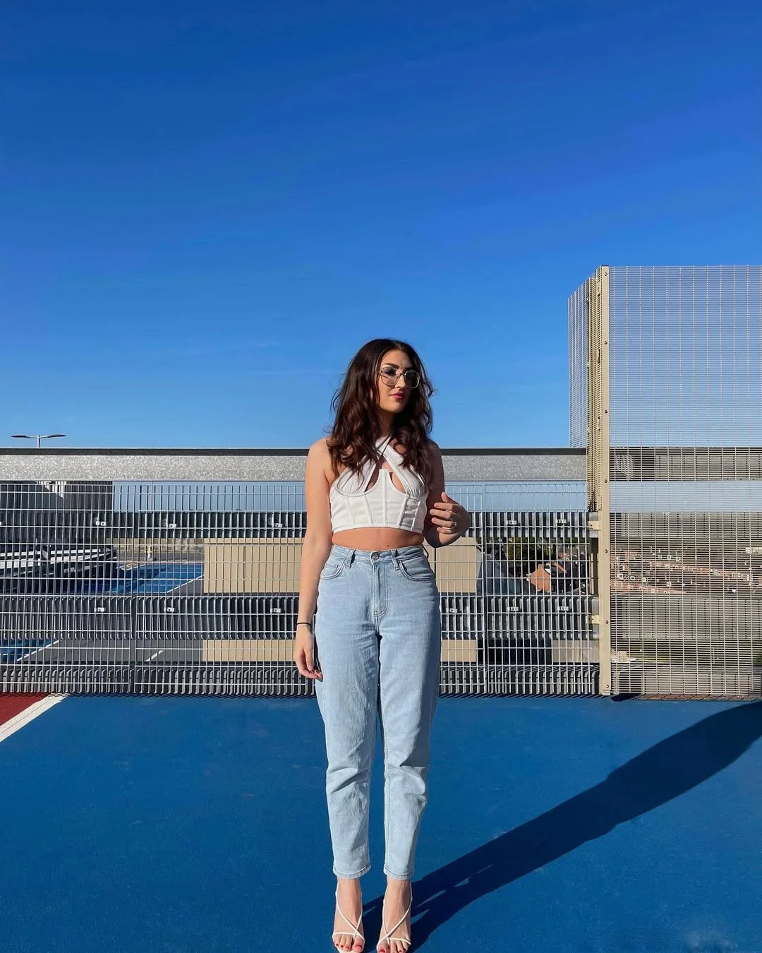 24 June Outfits Ideas for women 2026 White Corset Tops And Straight Jeans Are The New Minimalist Night Out Formula