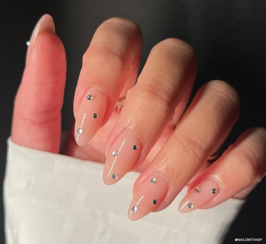 25 light summer nails 2026 Minimal Crystal Nude Nails That Catch Evening Light