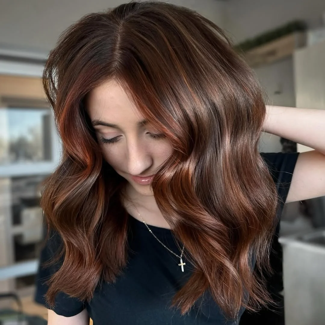 mirror shine summer glossy hair color ideas 2026 Soft Cinnamon Gloss With Dimensional Brunette Waves