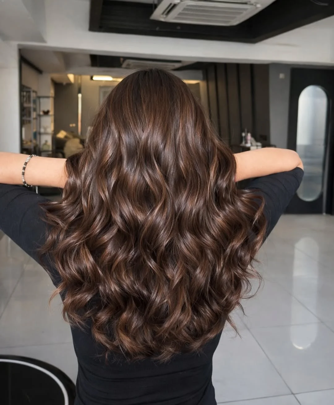 mirror shine summer glossy hair color ideas 2026 Deep Espresso Brunette With Cascading Glam Waves