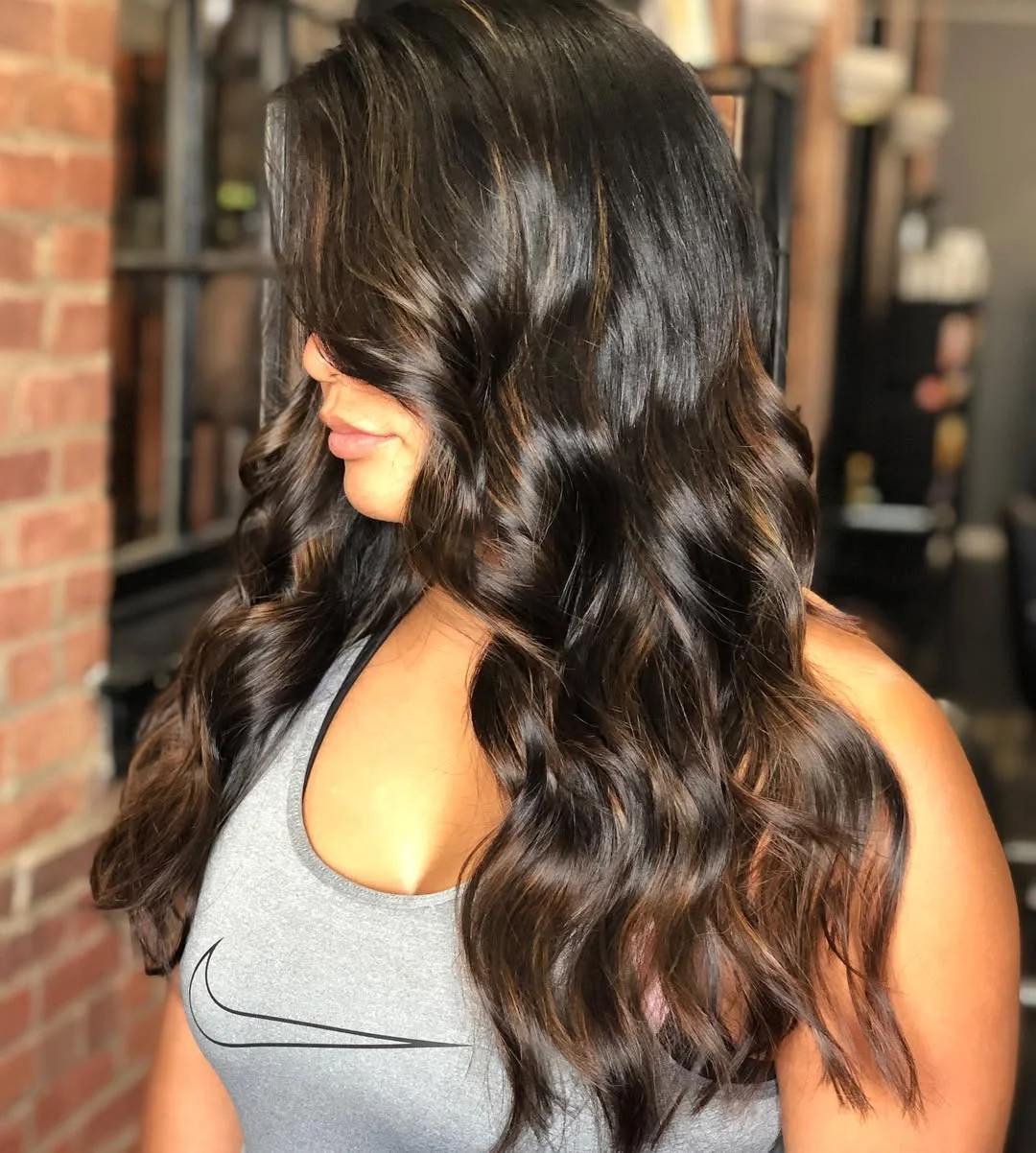 mirror shine summer glossy hair color ideas 2026 Dark Espresso Waves With Glossy Cinnamon Dimension