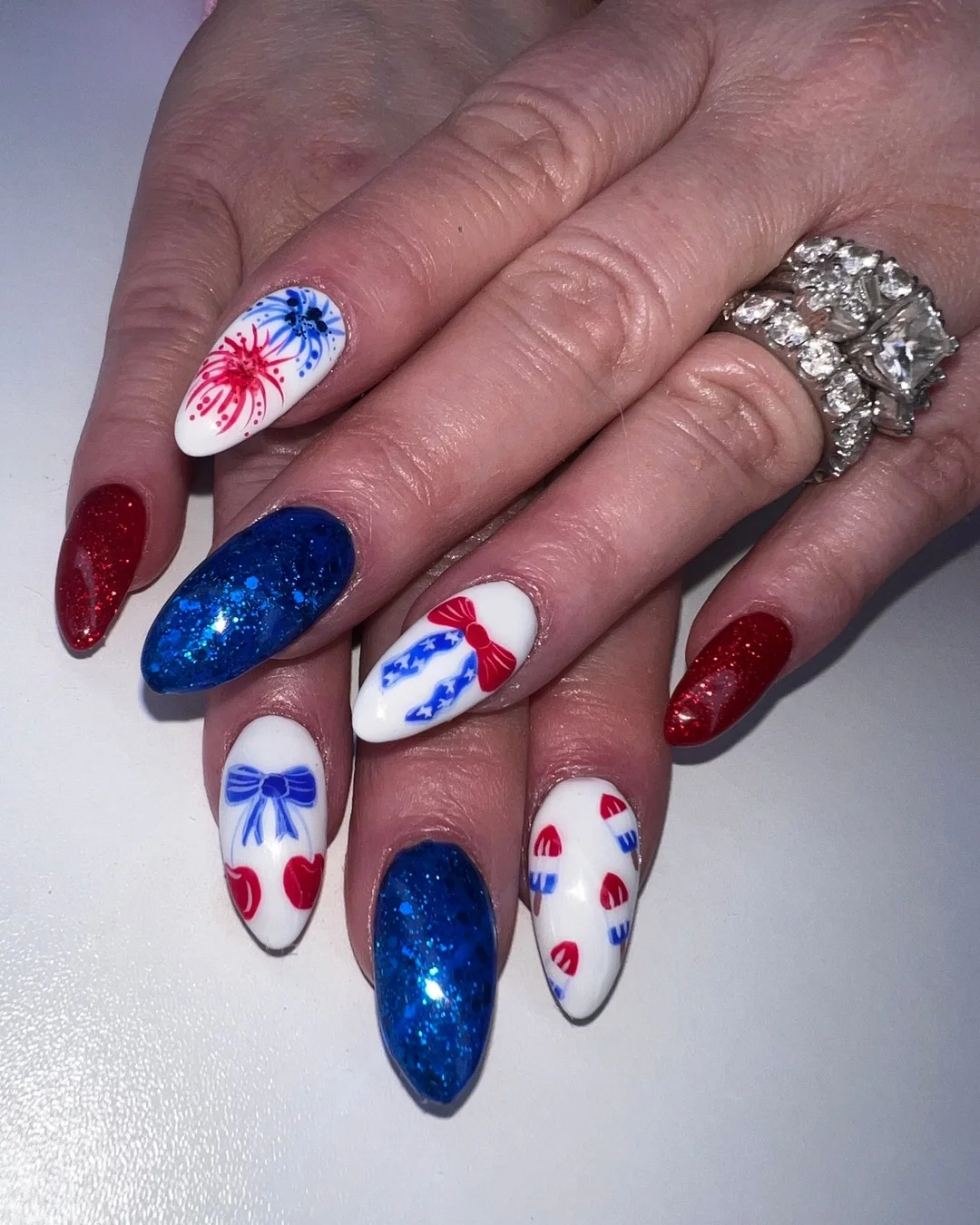 patriotic nails 2026 Firework Inspired Nails With Glittery Summer Drama