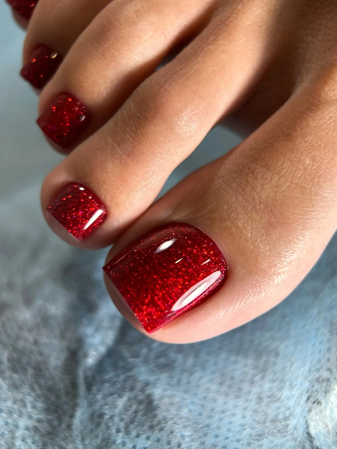 23 pedicure ideas summer trends 2026 Ruby Red Glitter Pedicure That Owns Every Summer Night