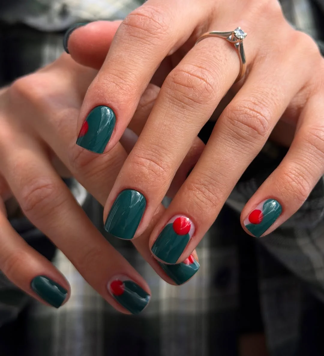 23 short squoval nails design 2026 Deep Emerald Dots With a Modern Holiday Twist