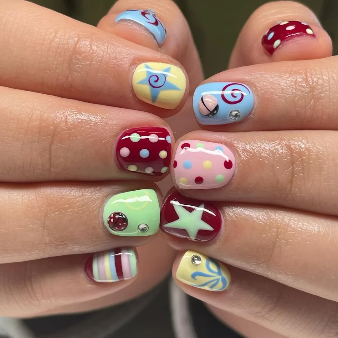 23 short squoval nails design 2026 Candy Colored Mix and Match Nails Full of Personality