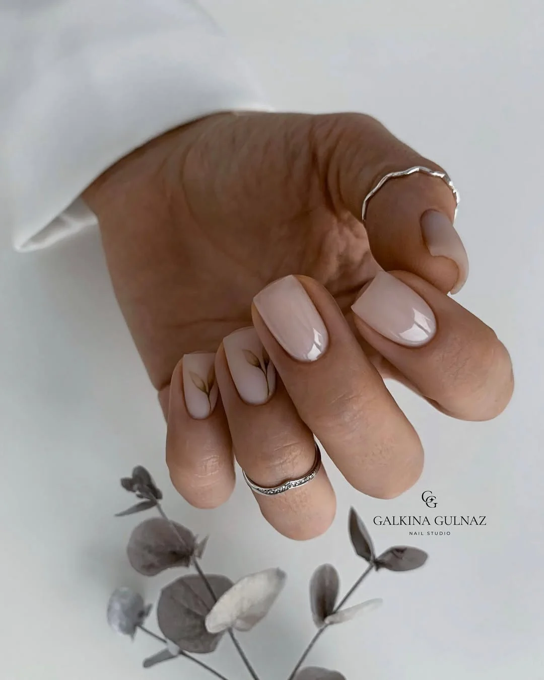 23 short squoval nails design 2026 Soft Nude Botanical Nails With Quiet Luxury Appeal