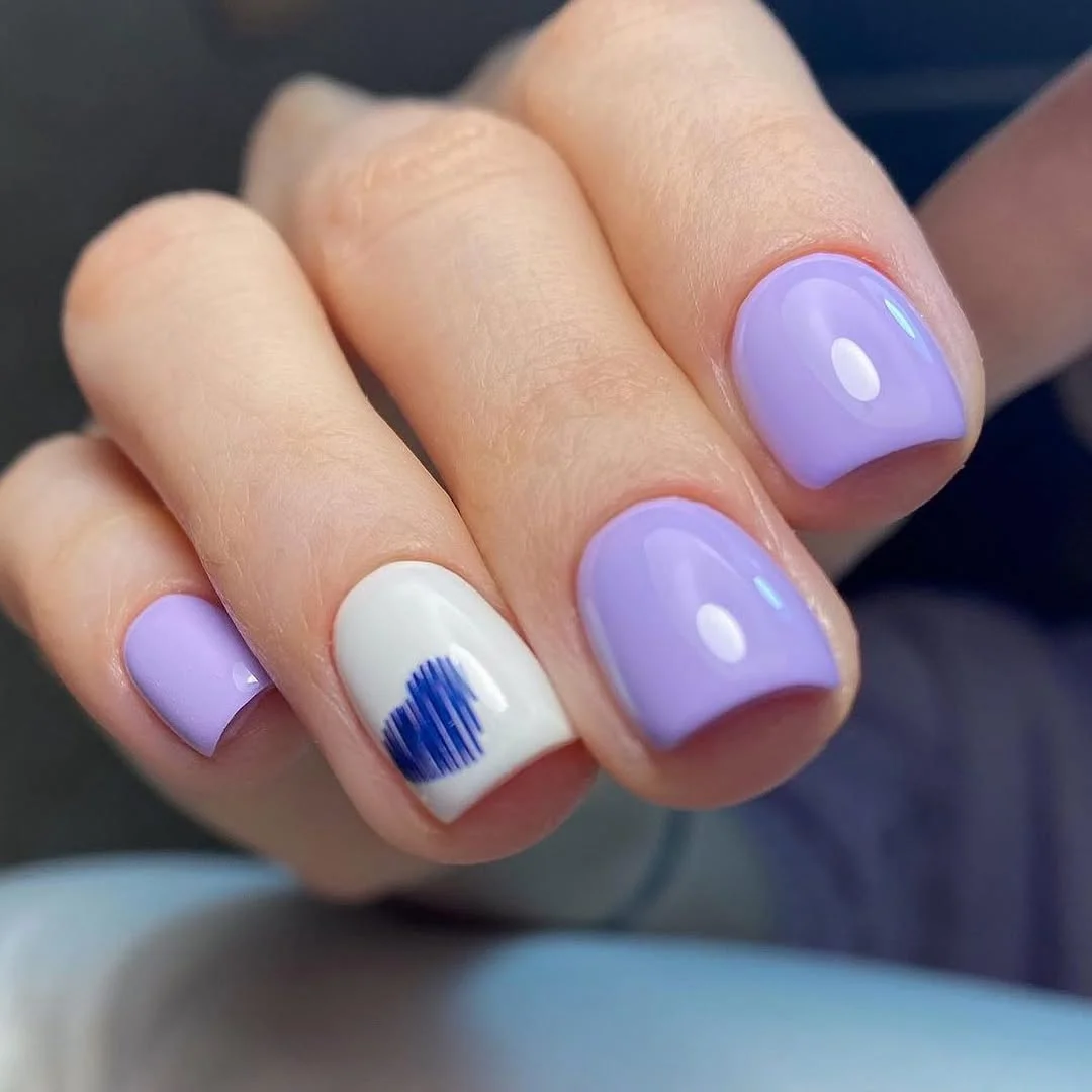 23 short squoval nails design 2026 Lavender Minimalism With a Classy Blue Heart Accent