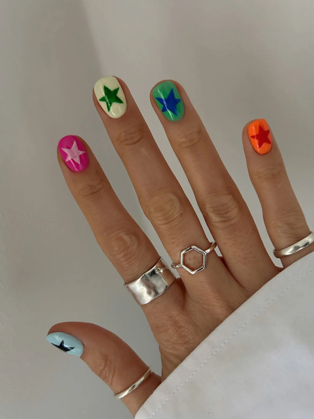 23 short squoval nails design 2026 Colorful Star Nails With Retro Energy