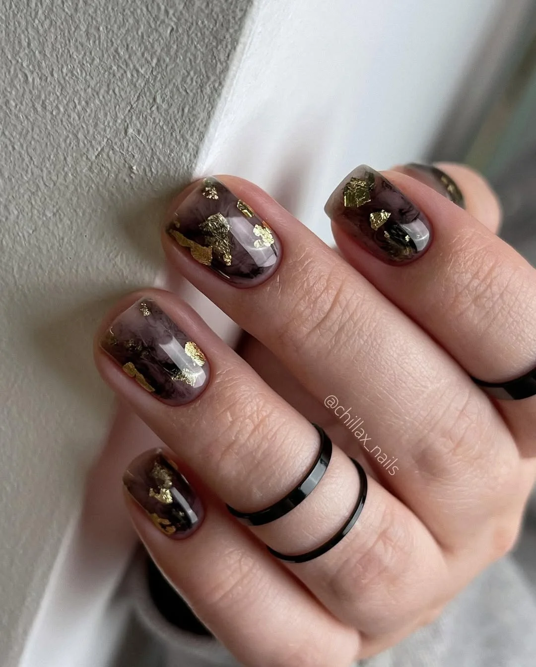 21 short summer nails 2026 Smoky Cocoa Marble Nails With Gold Foil Texture