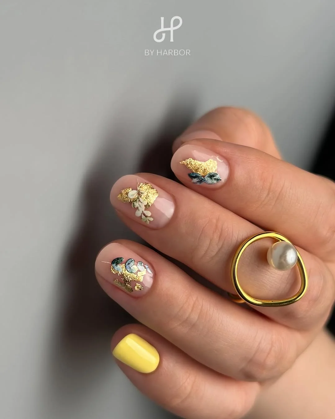 21 short summer nails 2026 Soft Yellow Botanical Nails With Gold Foil Accents
