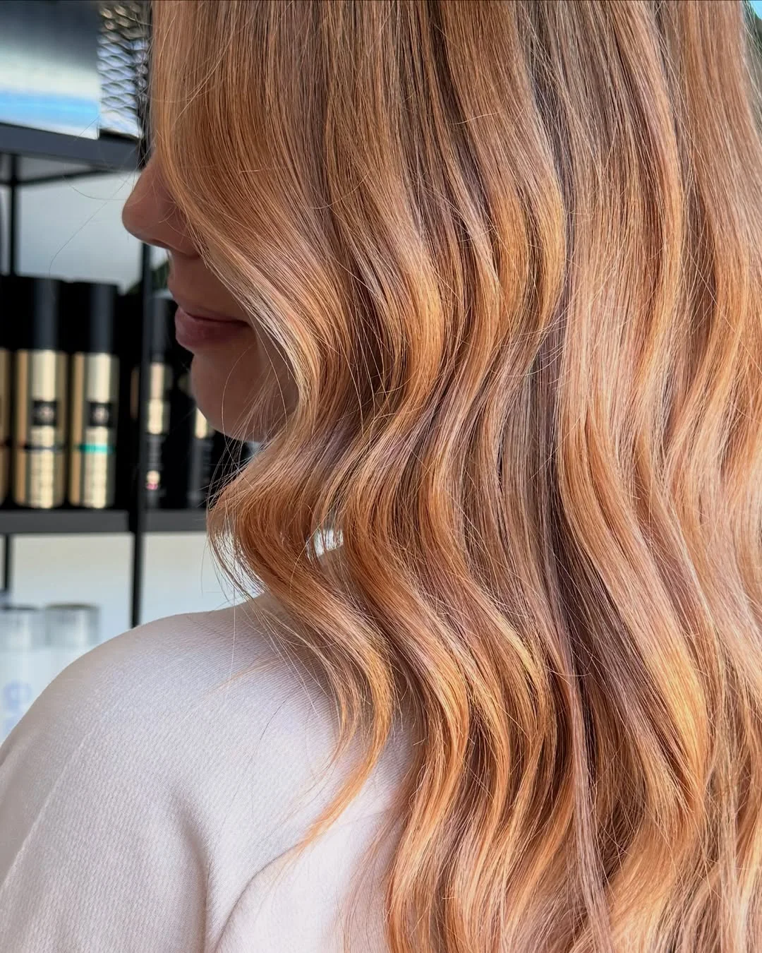 soft summer apricot blonde hair color 2026 Warm Apricot Ribbon Highlights with Copper Depth