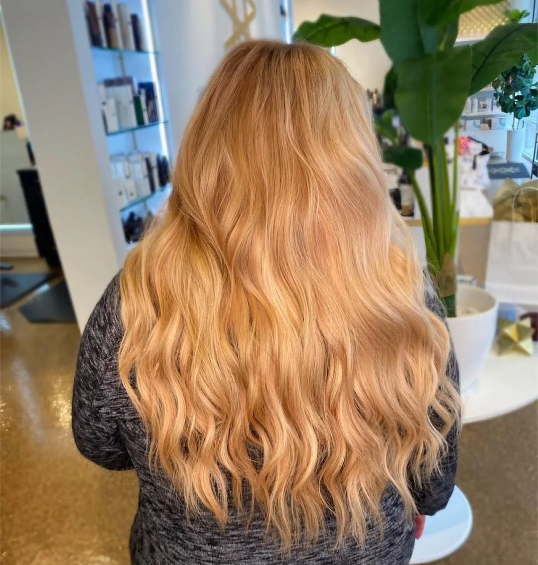 soft summer apricot blonde hair color 2026 Warm Apricot Blonde with Subtle Honey Flow