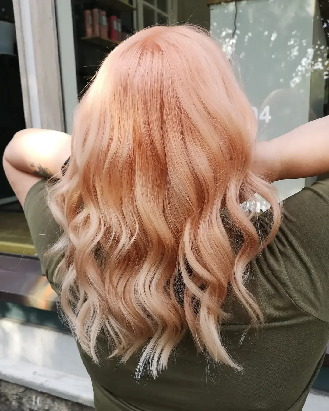 soft summer apricot blonde hair color 2026 Soft Pearl Apricot Balayage with Light Blonde Ends