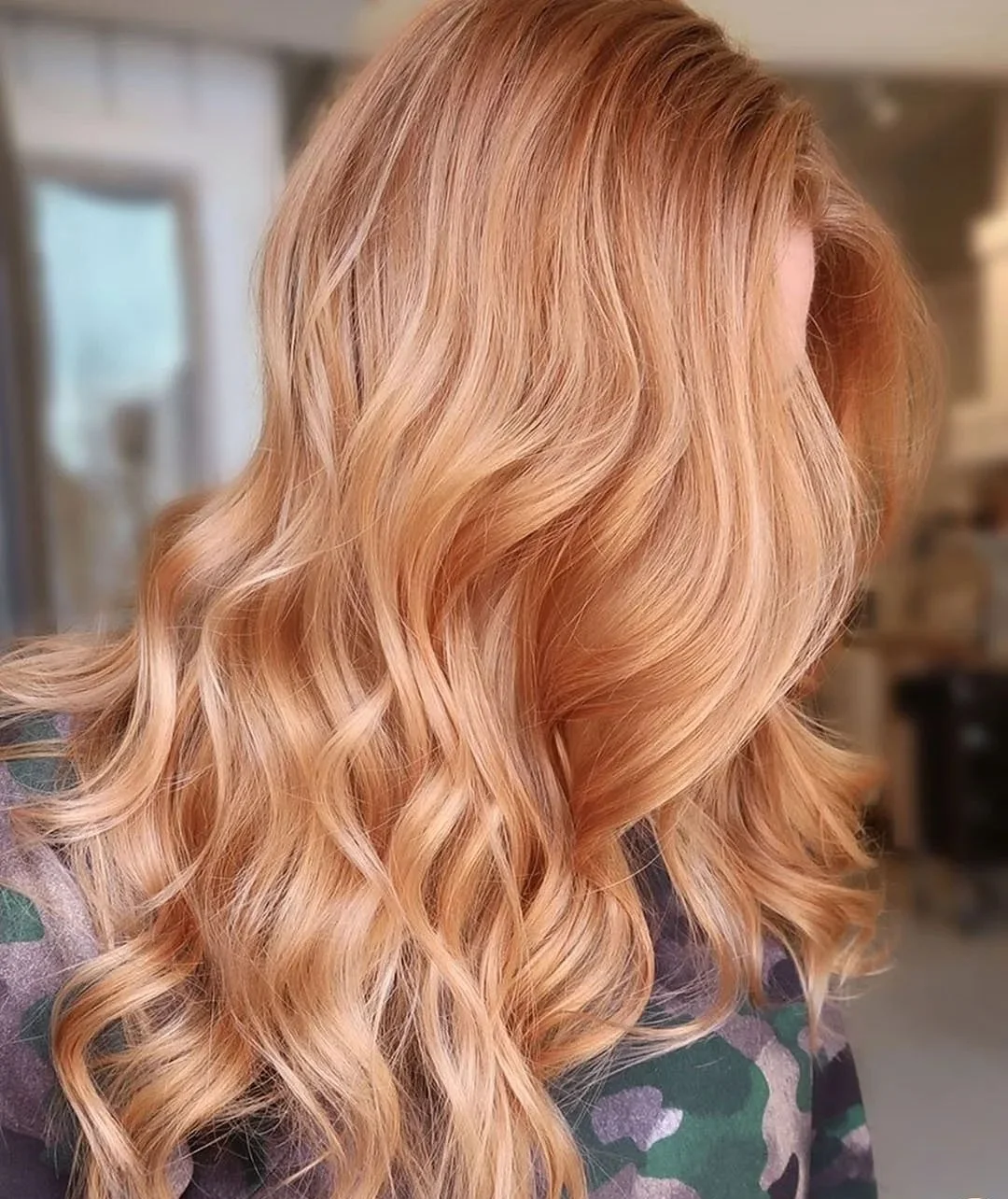 soft summer apricot blonde hair color 2026 Soft Golden Apricot Blonde with Airy Balayage Finish