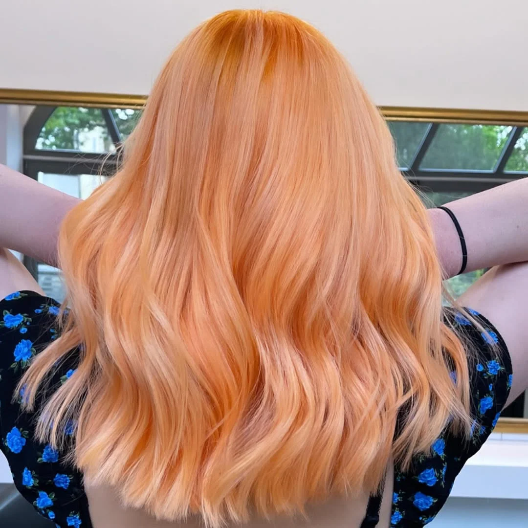 soft summer apricot blonde hair color 2026 Sunlit Apricot Blonde with Soft Copper Movement