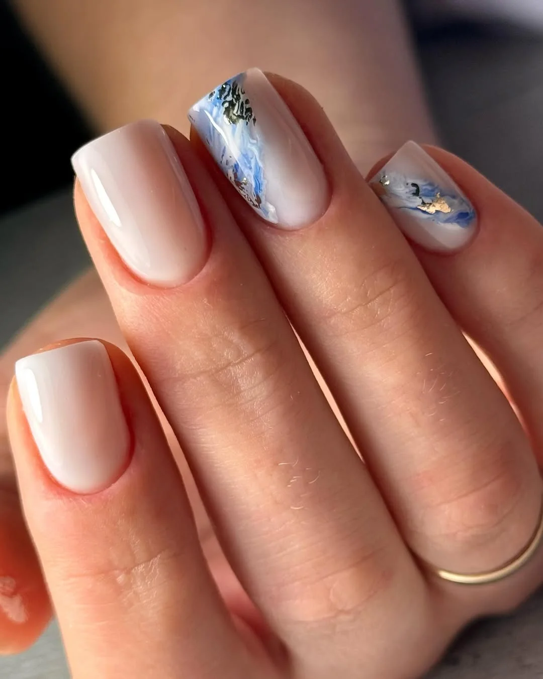 summer beach nails 2026 Milky White Marble Nails With Ocean Wave Accents