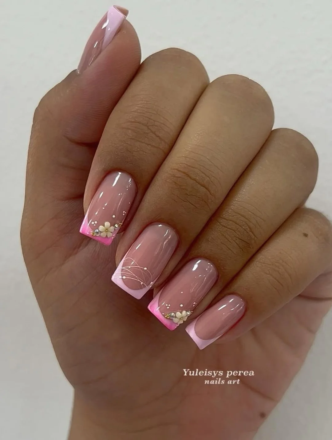 Summer French nails ideas 2026 Soft Pink Floral French Nails With Delicate Pearl Details