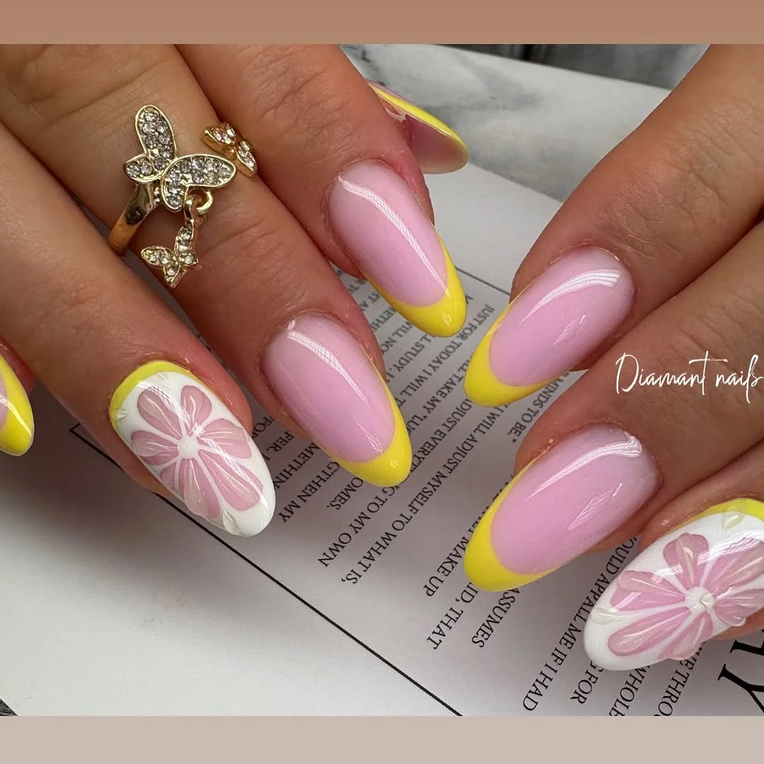 Summer French nails ideas 2026 Yellow French Tips With Oversized Floral Nail Art