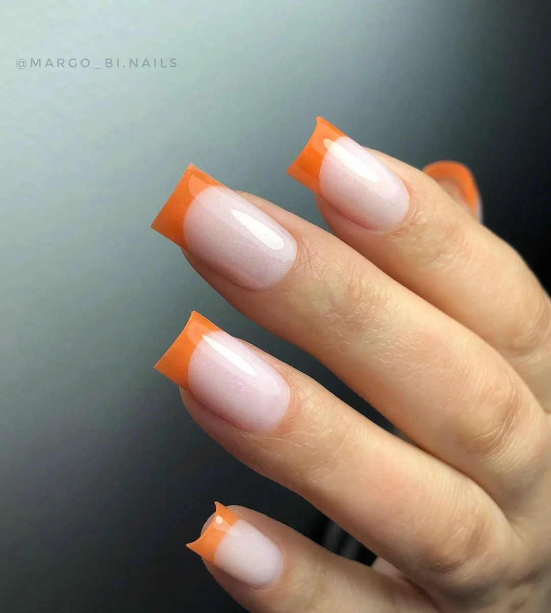 summer french tip nails 2026 Glossy Orange French Tips That Feel Like Late Summer Sunsets