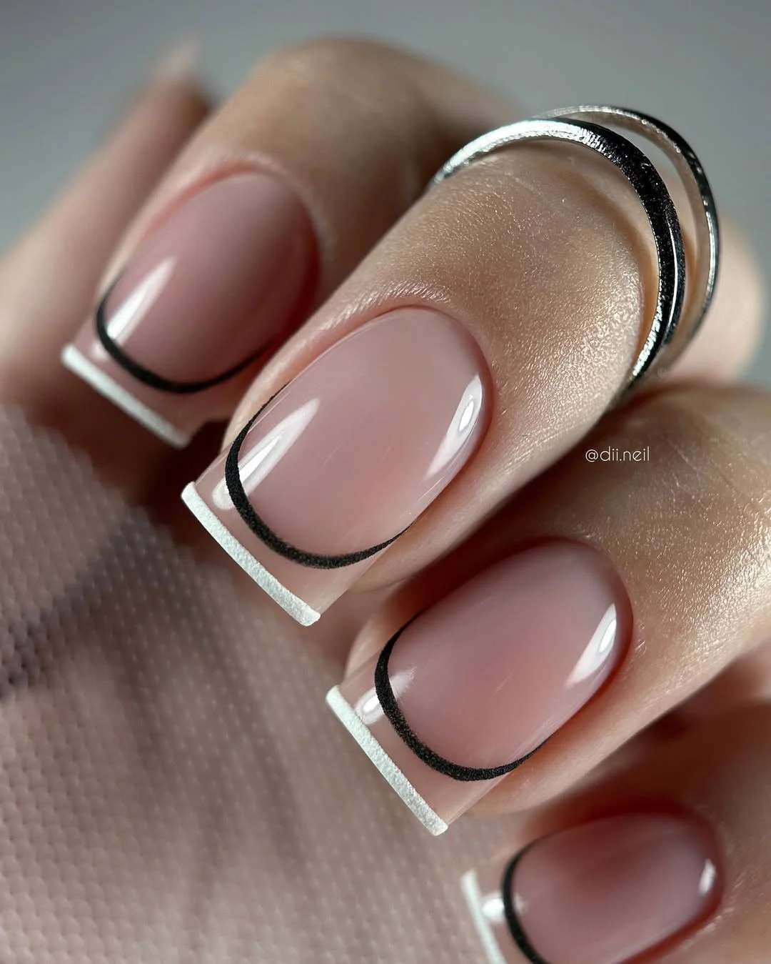 summer french tip nails 2026 Graphic Black Outline French Tips With Modern Edge