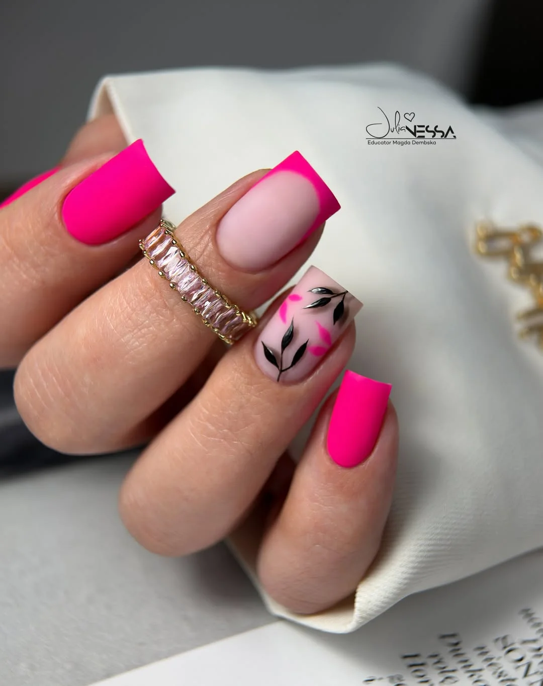 21 summer manicure color ideas 2026 Matte Neon Pink Nails With Delicate Botanical Art