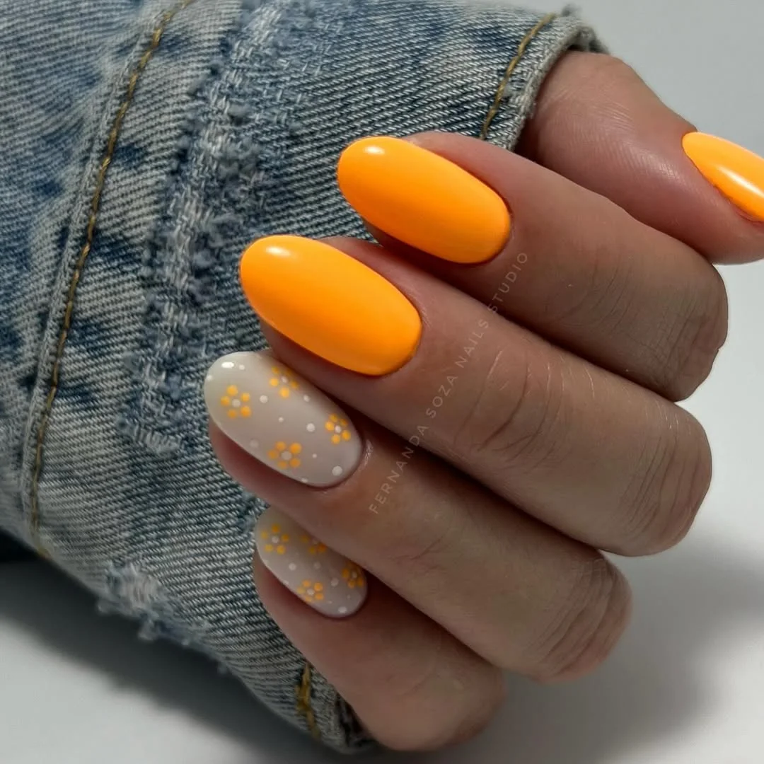 21 summer manicure color ideas 2026 Sunny Tangerine Nails With Tiny Daisy Details