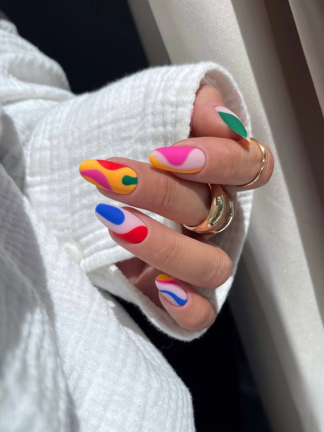 21 summer manicure color ideas 2026 Playful Pop Art Swirls in Vivid Summer Shades