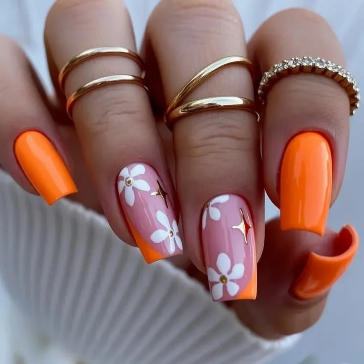 summer nail art 2026 Glossy Orange Daisy Nails That Scream Late Summer Happiness