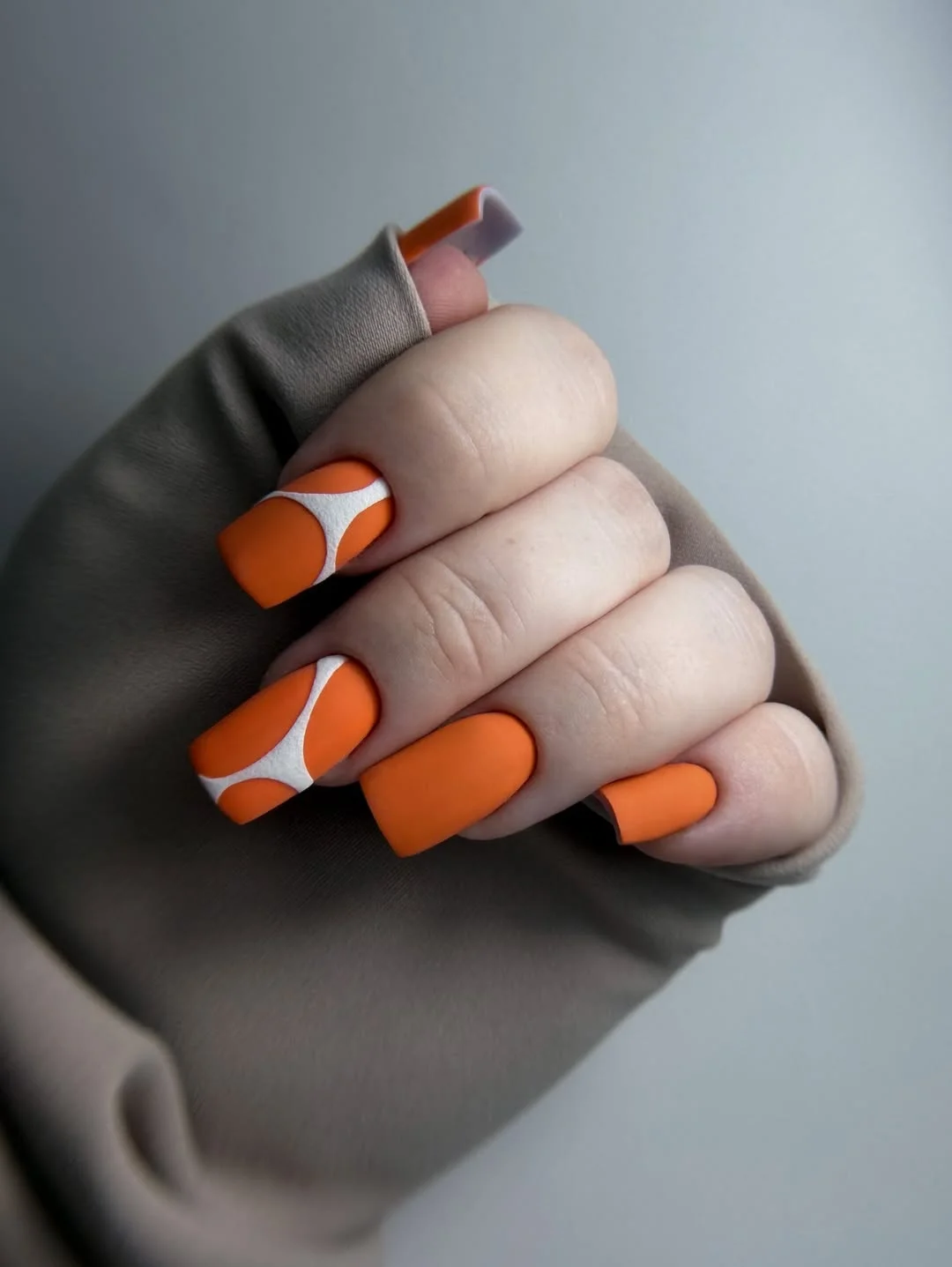 summer nail art 2026 Matte Tangerine Nails With Retro White Curves