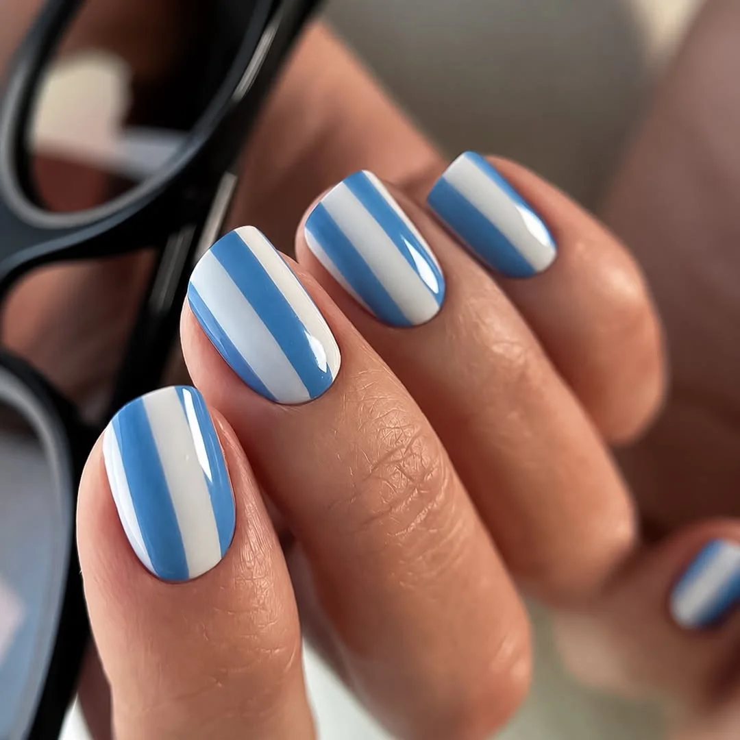 summer nail art 2026 Minimal Blue Stripe Nails That Still Feel Crisp In Heatwaves