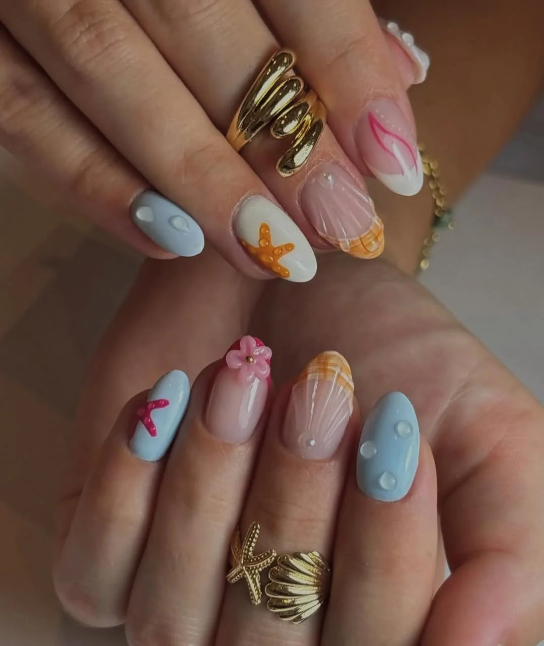 23 Summer nail art ideas 2026 Seashell Gloss Nails With Soft Coastal Energy
